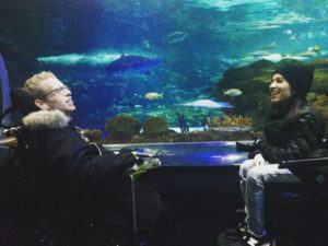 Maayan Ziv and Tim Rose smiling at Ripleys Aquarium