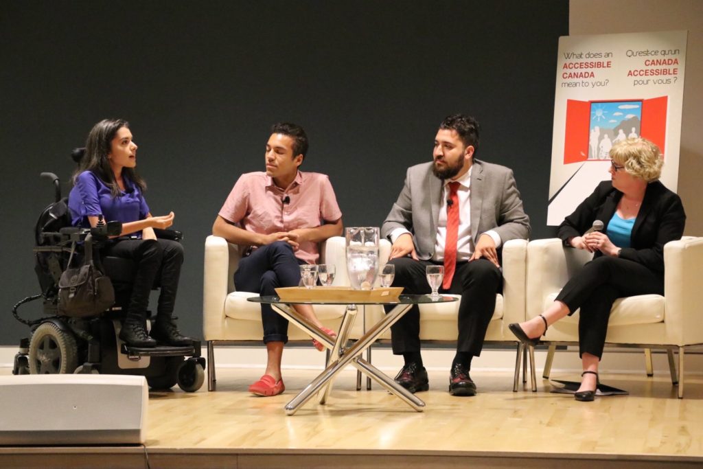 Youth panel discusses innovation with Carla Qualtrough. Maayan Ziv sits on left next to 2 others, followed by the Minister.