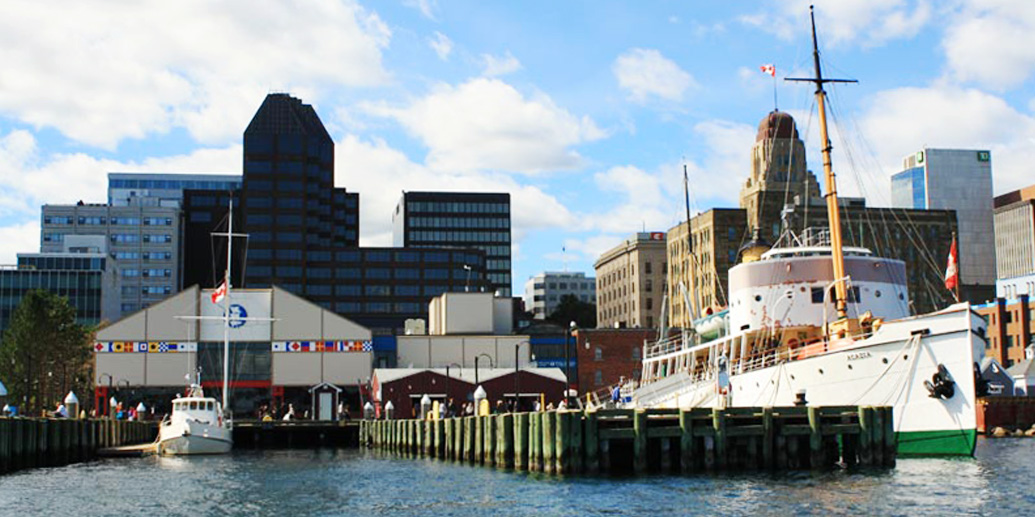 halifax harbour with dock and large sail boat