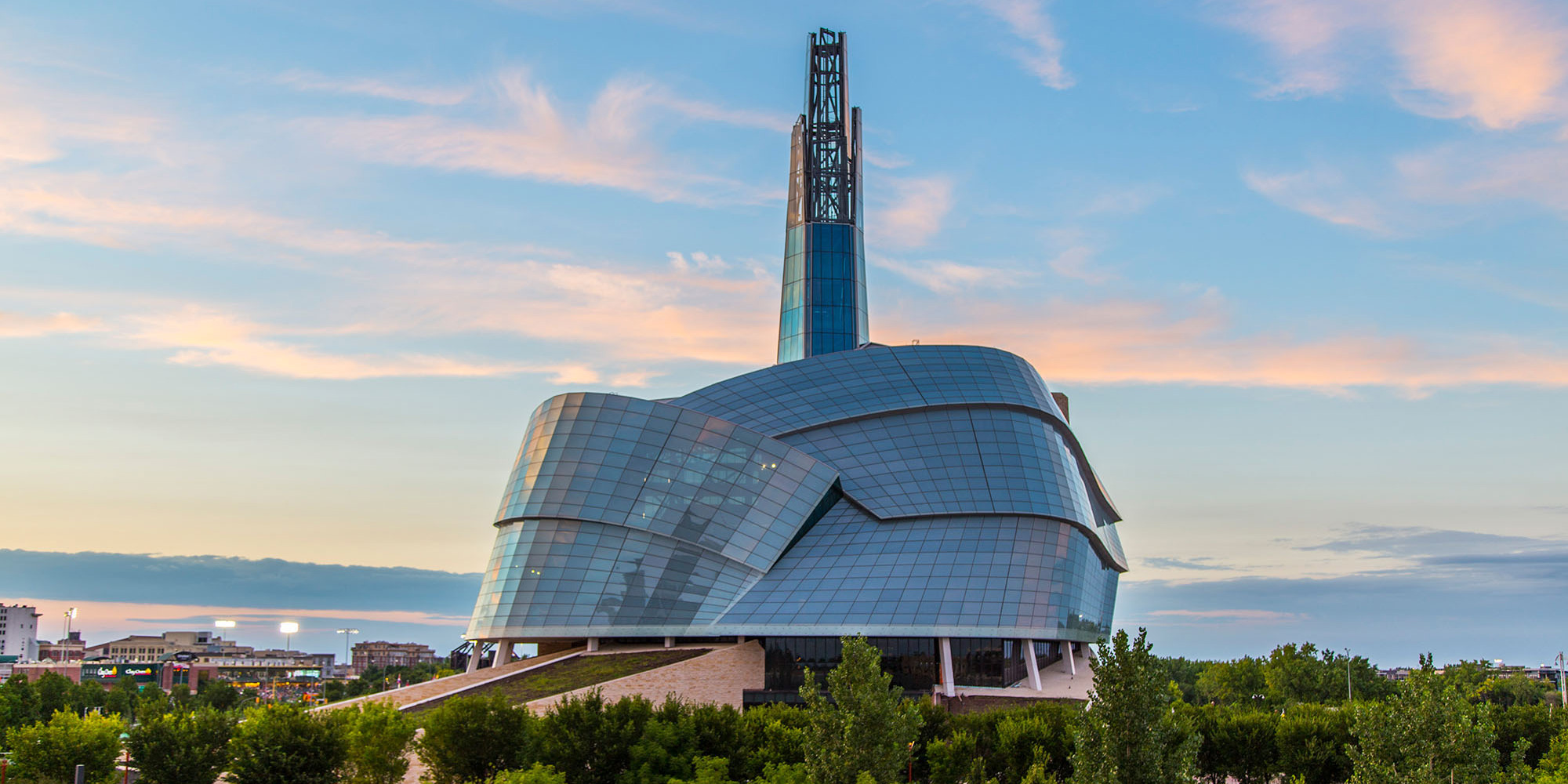 wide shot of Canadian Museum of Human Rights exterior at sunset.