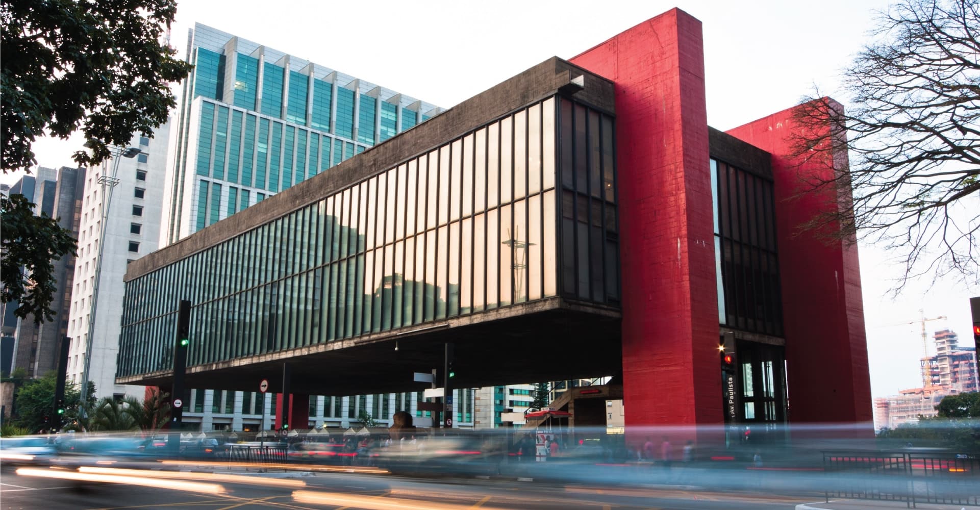 exterior of entire masp museum, glass box with red pillars
