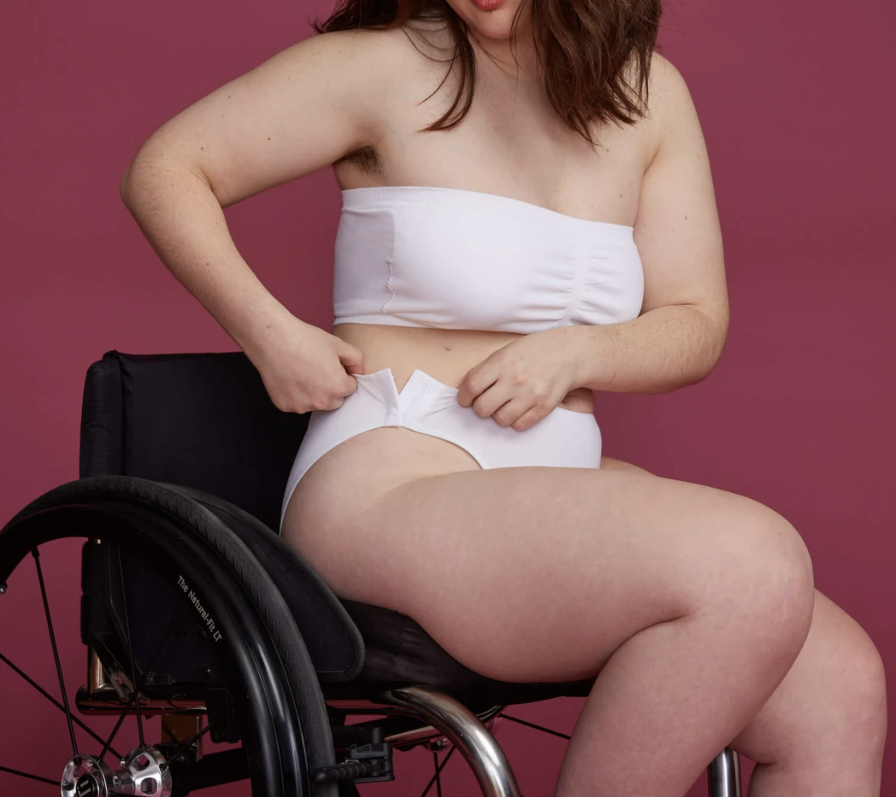 woman in side fastening panties sits in her wheelchair