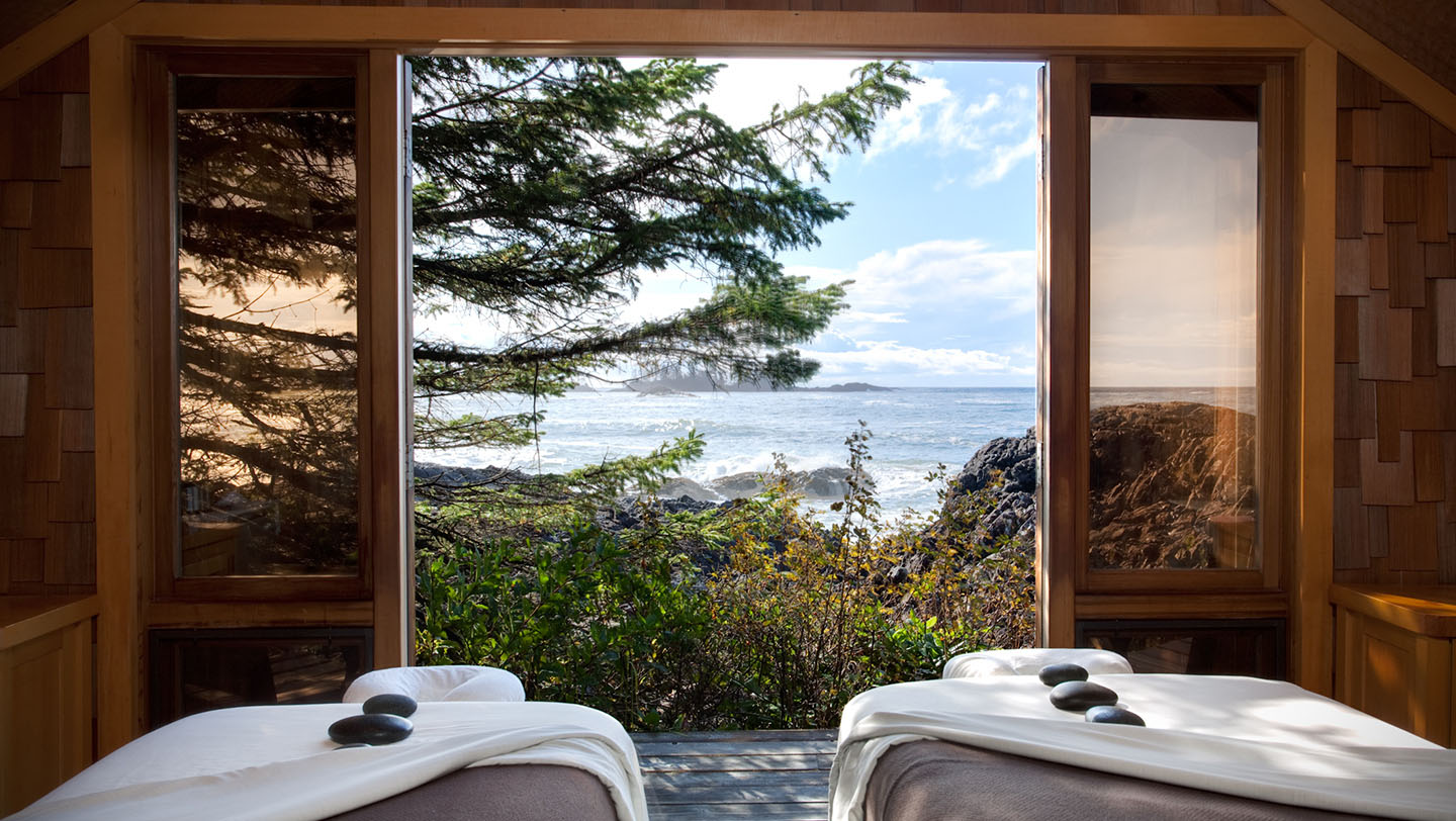 2 massage tables overlooking a beautiful ocean side view
