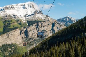 Gondala ride across Banff, beautiful snowcapped mountatins