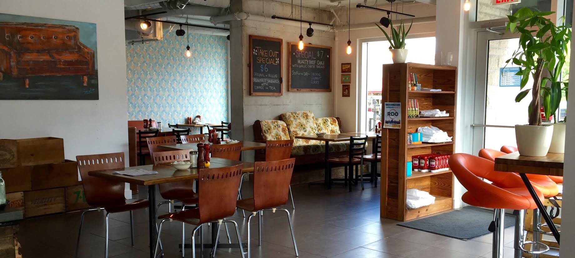 Inside Chesterfield's Gastro Diner. Spacious, low-table tops, wooden furnishing.