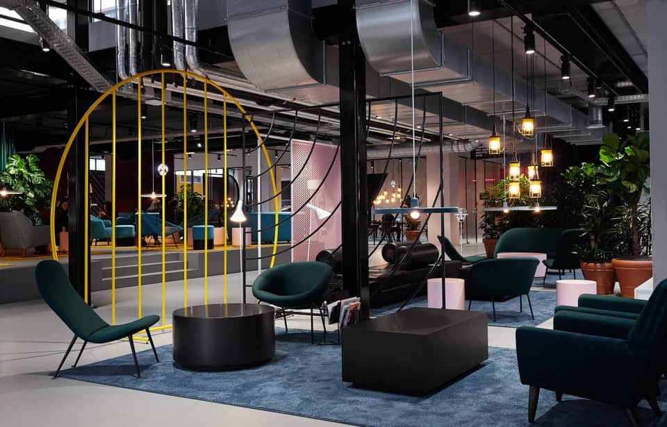 common area of student hotel amsterdam. lounge chairs with modern decor and furnishing