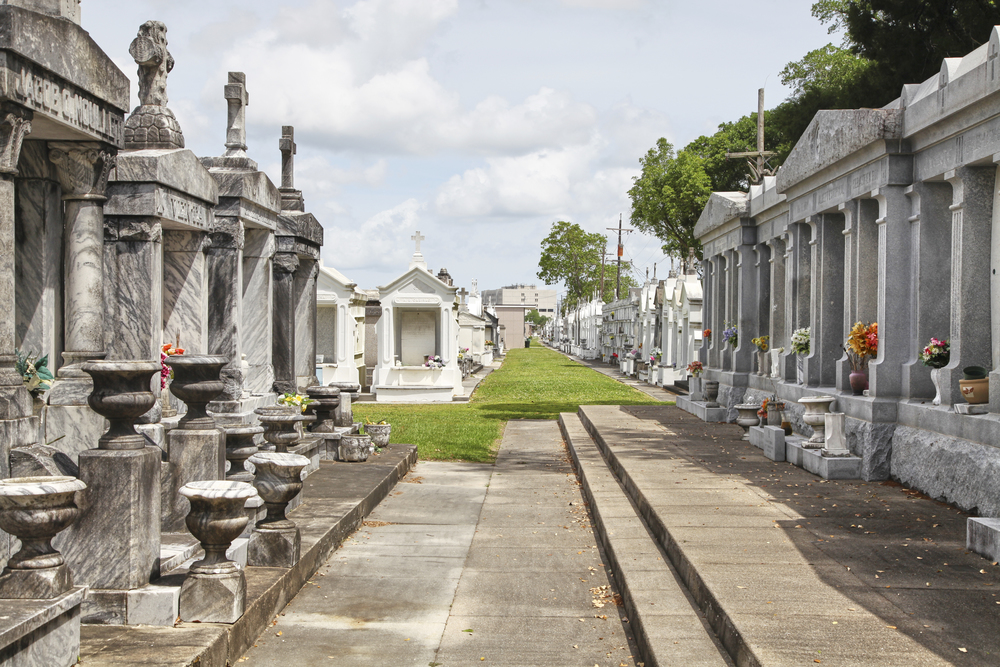 Cemetary with several graves left and rigtht 