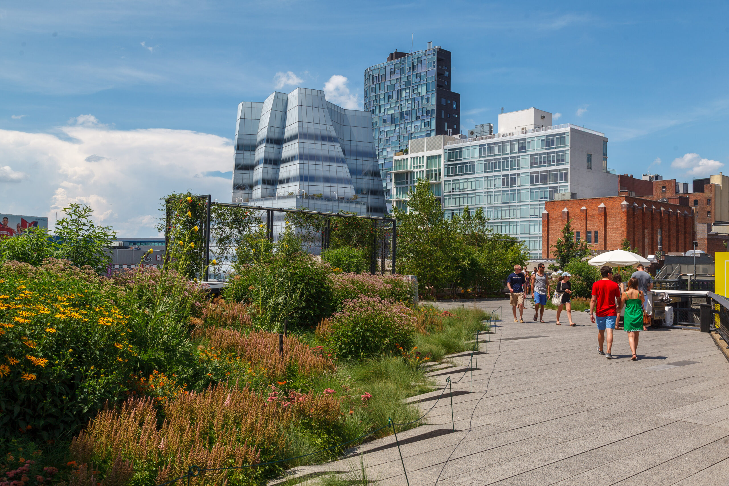 Tourists and the paths of the High Line Elevated Linear Park New York City