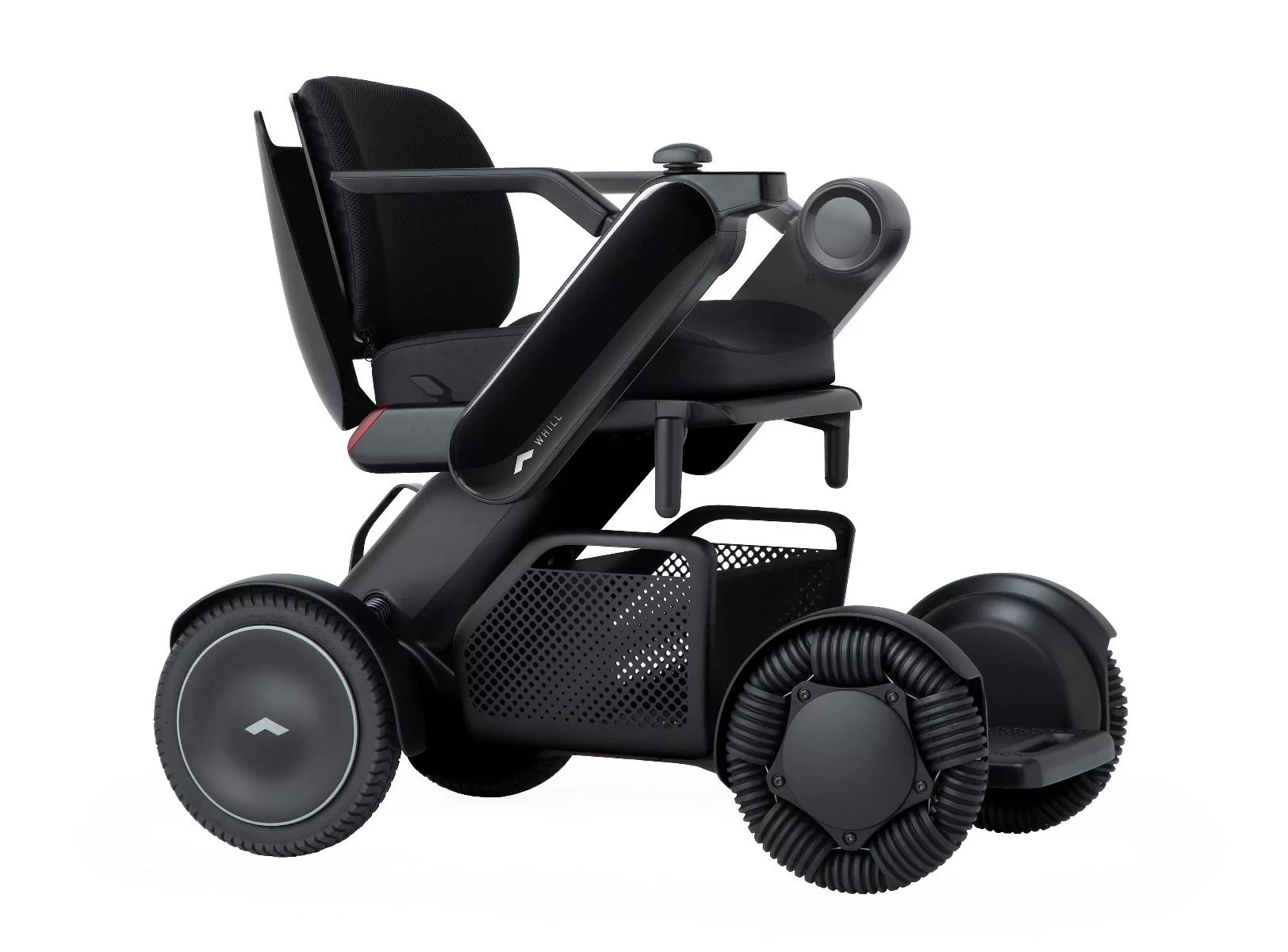 The WHILL Model Ci2 power wheelchair. This is a black power wheelchair 