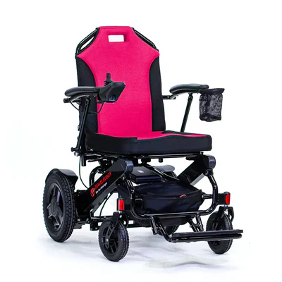 A pink version of the CITY 2 PLUS power wheelchair by Travel Buggy. 