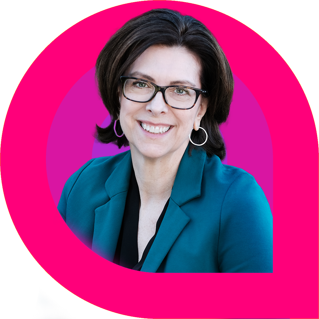 Stephanie Cadieux, a woman with short dark hair and glasses, smiles warmly while wearing hoop earrings and a teal blazer over a black top. The portrait is framed by bold pink and magenta graphic rings, giving it a vibrant and contemporary look.