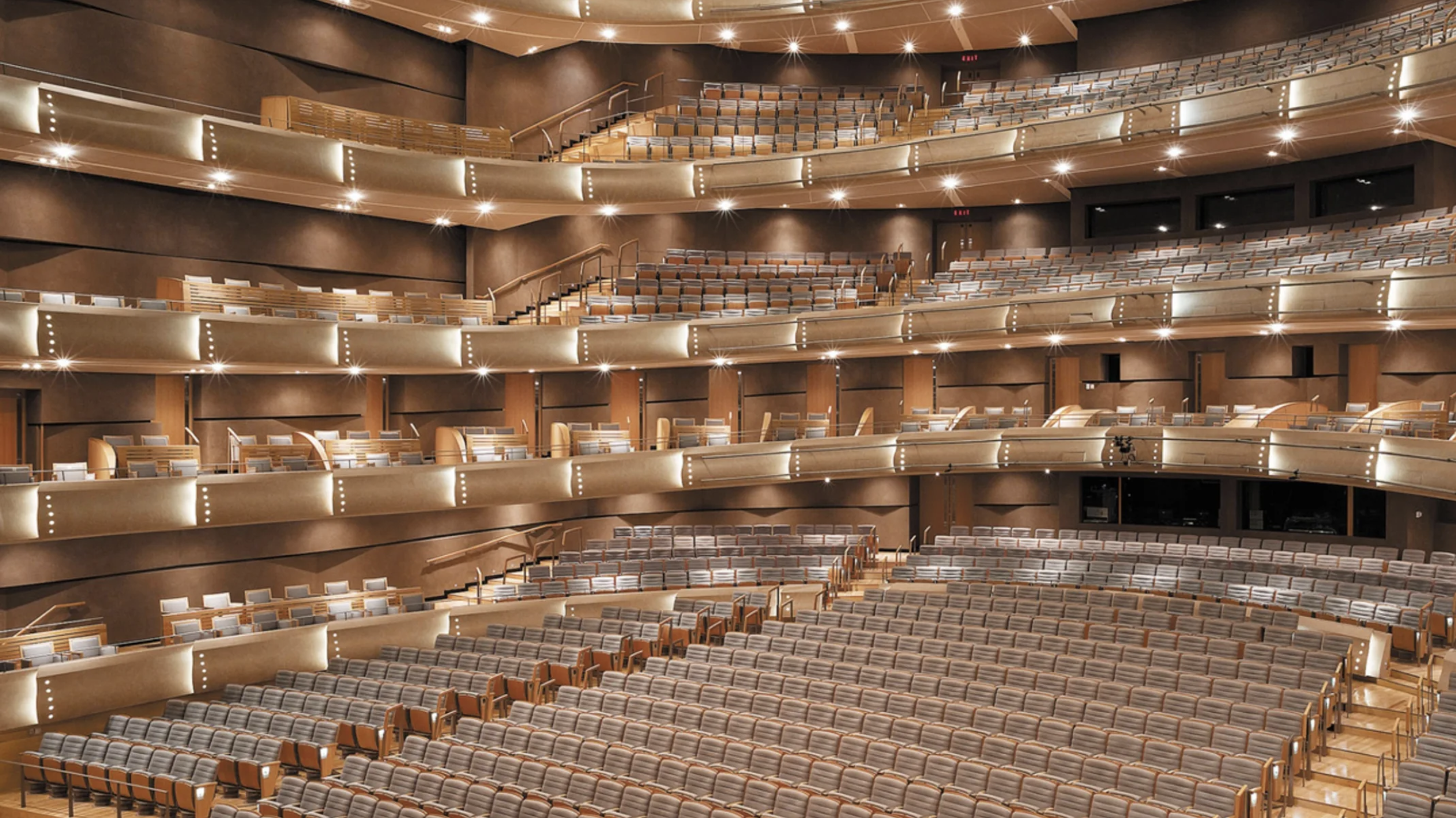 four seasons interior of performing arts centre. all light wood with many levels.