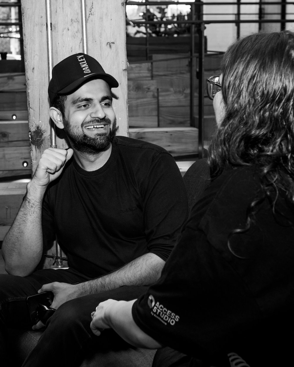 man smiles talking to another futures facilitator