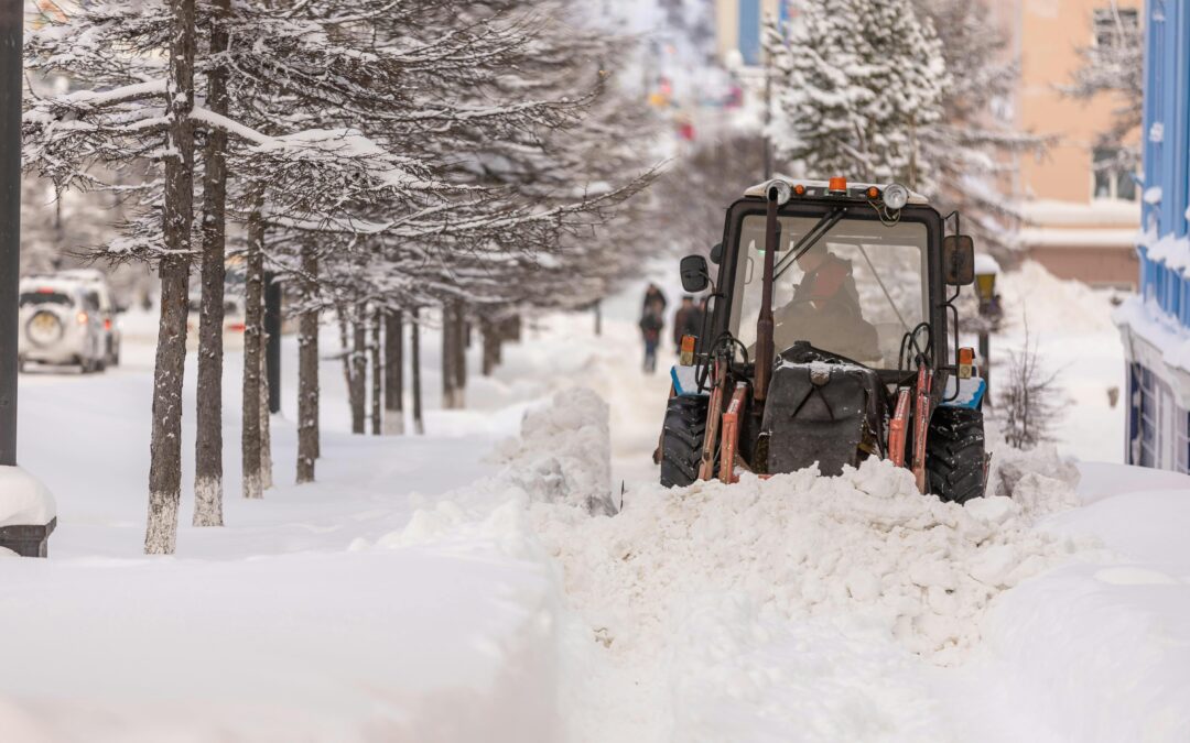 Snowplow Clearing Snow from Urban Street